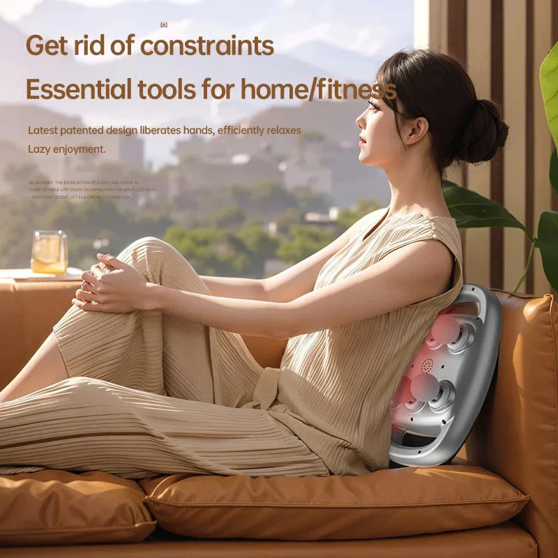 Woman using a massage pillow on a couch with a scenic background